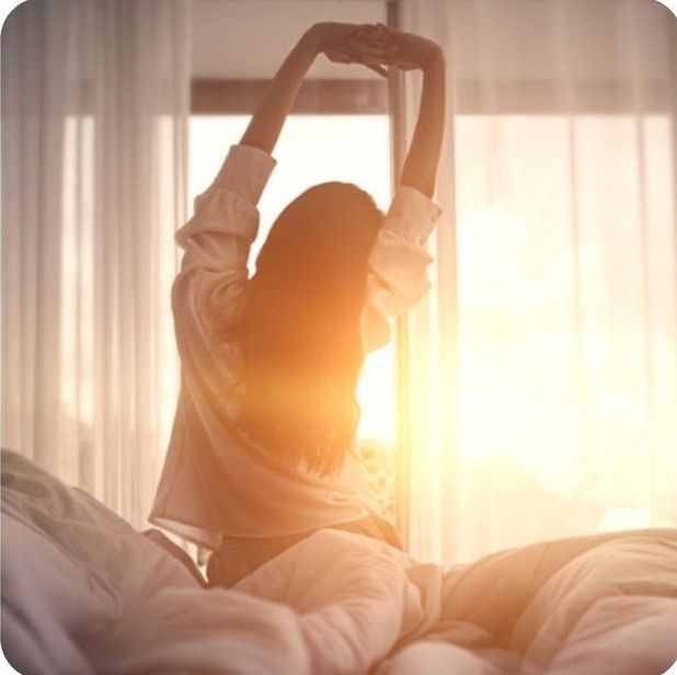 Abstract soft green shapes suggesting morning light in a quiet room